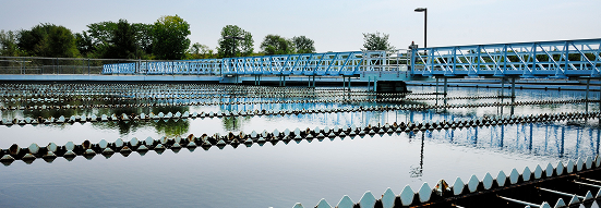 BPU water treatment plant with sedimentation basins and blue walkway